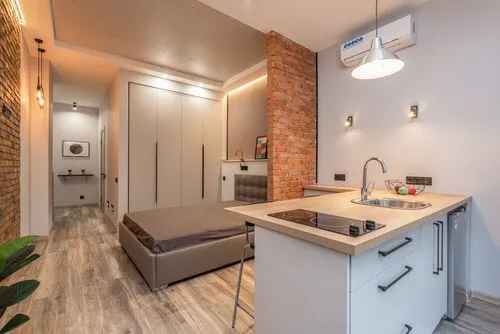 Apartment interior in Porvorim, Goa with bedroom, living area and balcony